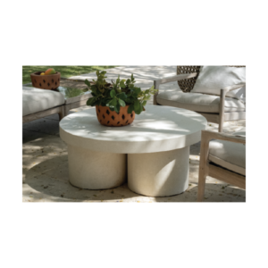 Round outdoor concrete coffee table in white concrete with cylindrical pillar base, sculptural furniture by Gola Home in the Dominican Republic.