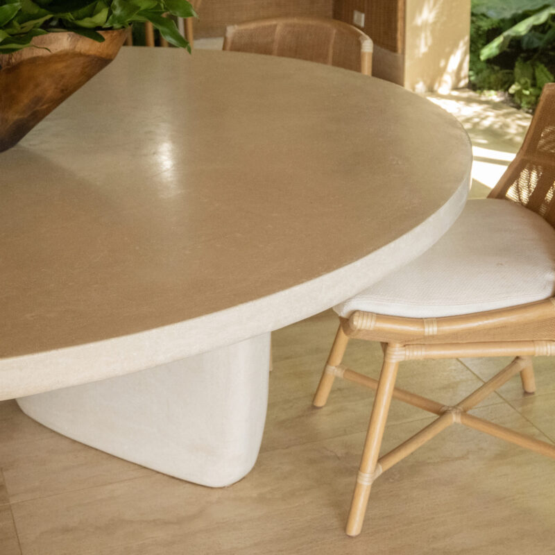 Round Dining Table PA by Gola Home, modern concrete furniture from the Dominican Republic with a natural wood top and three asymmetrically positioned white concrete bases.