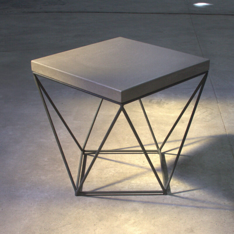 D1 Side Table with concrete top and geometric black metal base, handcrafted modern furniture by Gola Home in the Dominican Republic.