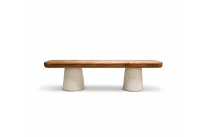 C1 Bench by Gola Home, modern concrete furniture from the Dominican Republic featuring two white concrete cone bases supporting a teak wood seat.