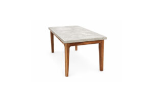 The W Dining Table by Gola Home reinterprets the classic dining table silhouette through material contrast and refined craftsmanship. A rectangular concrete top rests on four solid wooden legs, creating a balanced composition that blends strength and warmth. Handcrafted in the Dominican Republic, this modern concrete and wood dining table is designed for residential and hospitality interiors seeking timeless design, durability, and understated elegance.