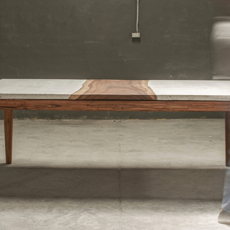 W Dining Table by Gola Home with rectangular concrete top featuring a natural live-edge wood insert at the center and four solid wooden legs, handcrafted in the Dominican Republic.