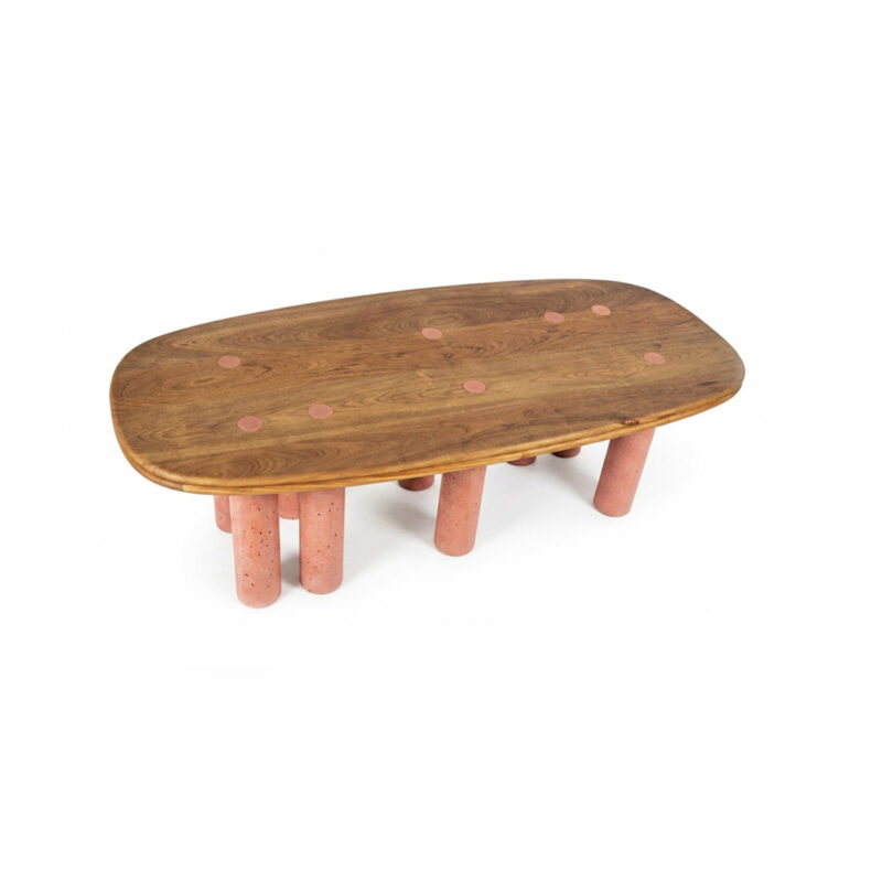 Pilares dining table with solid oak tabletop featuring terracotta concrete circular inlays aligned with eight supporting pillars, artisan Caribbean dining table for 6 to 8 people.