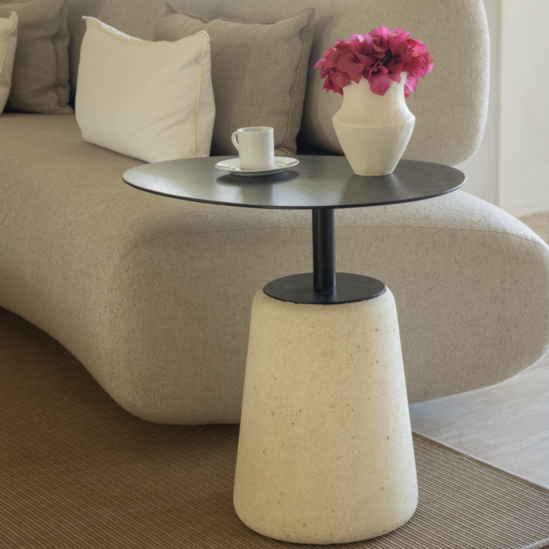 Seta auxiliary table with an organic-shaped tabletop supported by a slim metal rod and a conical white concrete base.