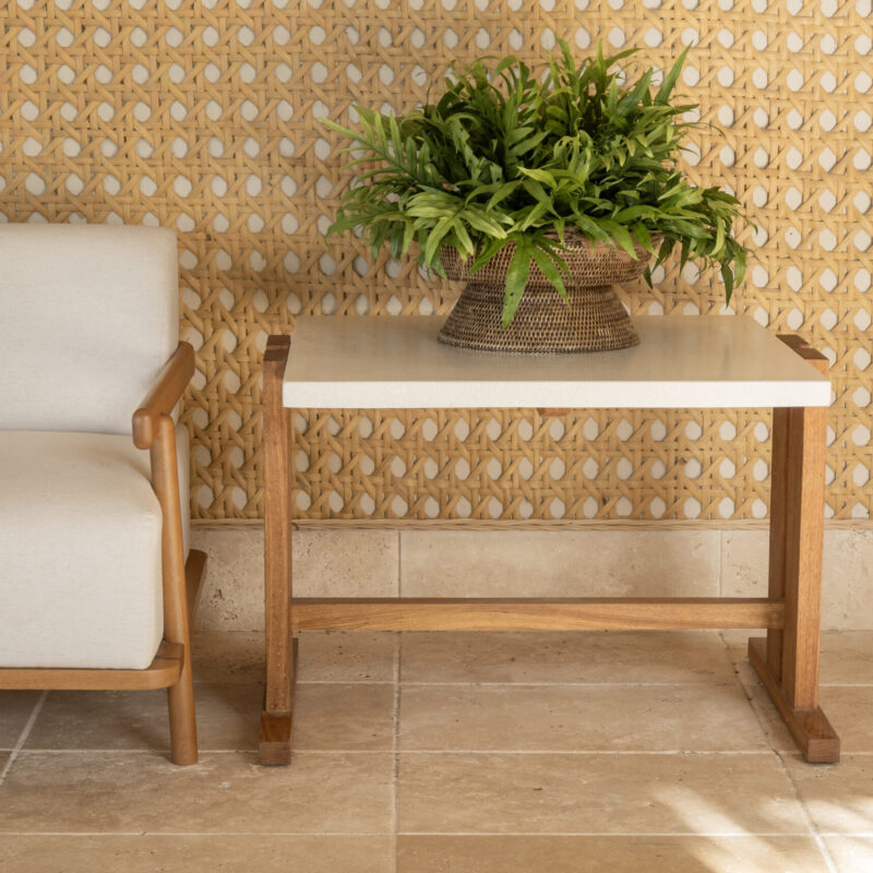Aguila Side Table with white concrete top and solid wood T-shaped base, handcrafted by Gola Home in the Dominican Republic.