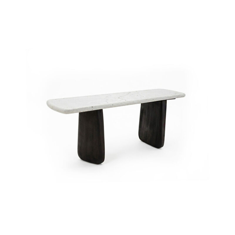 Organic console table with asymmetrical burnt wood legs and a rectangular polished concrete top with curved edges, perfect for modern interiors.