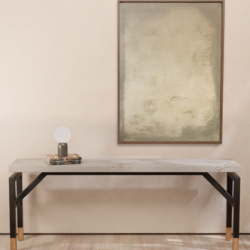 Floating console table in white veined concrete with hidden black metal structure and solid wood base, modern sculptural furniture by Gola Home, handcrafted in the Dominican Republic.